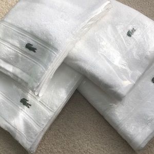 4 Brand new LACOSTE hand towels